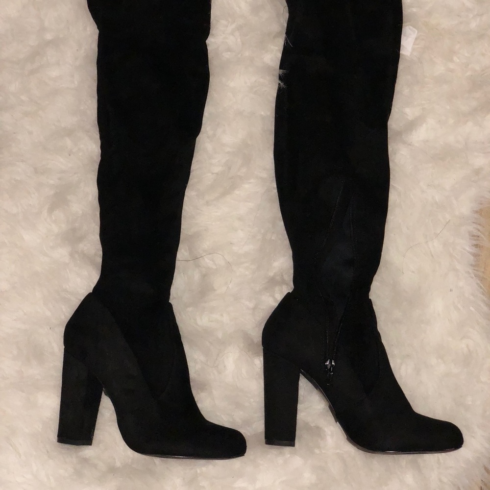 Thigh high black suede boots